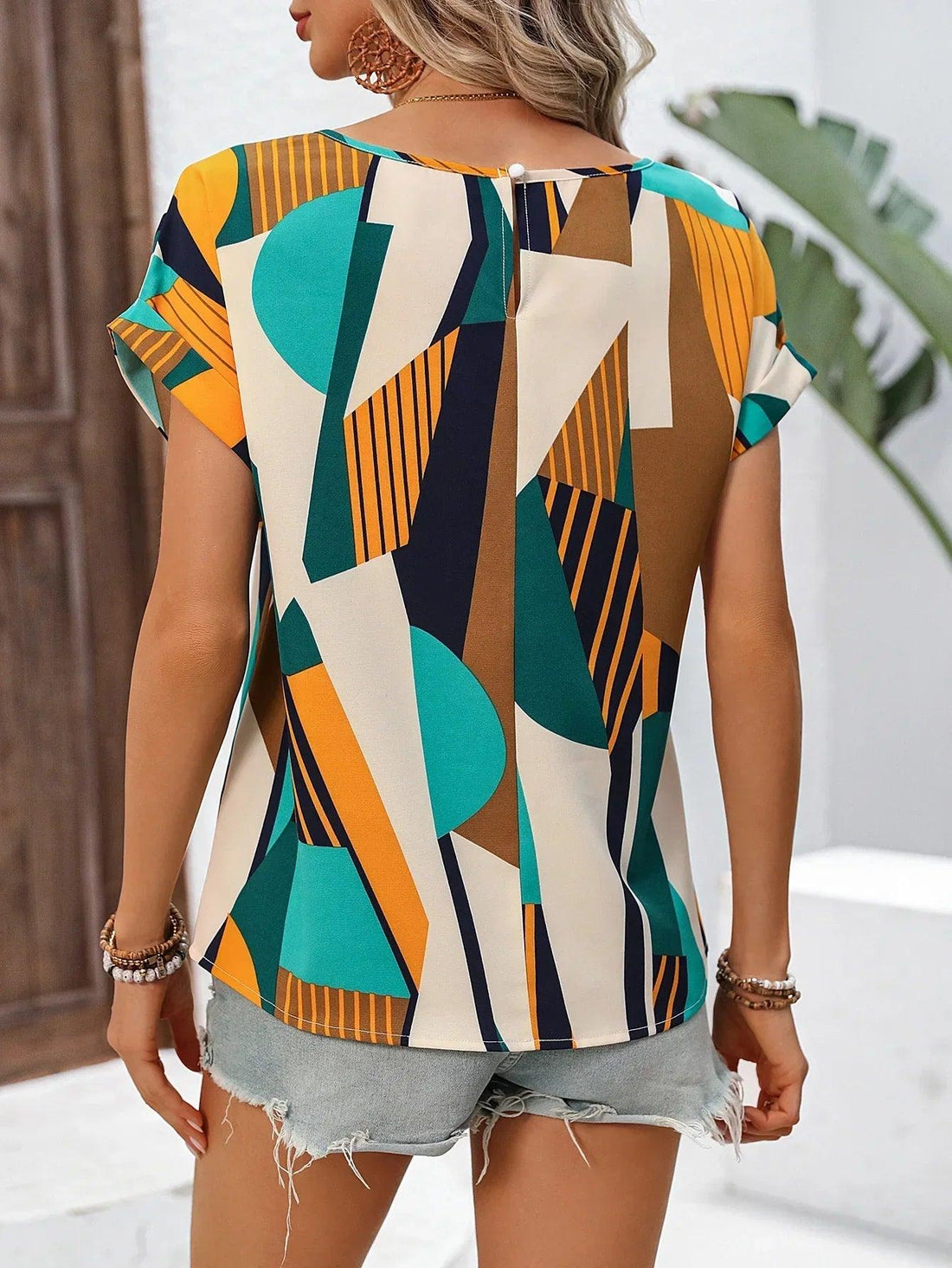 Cleo Damenbluse | Geometrisches Muster, Kurzarm 0