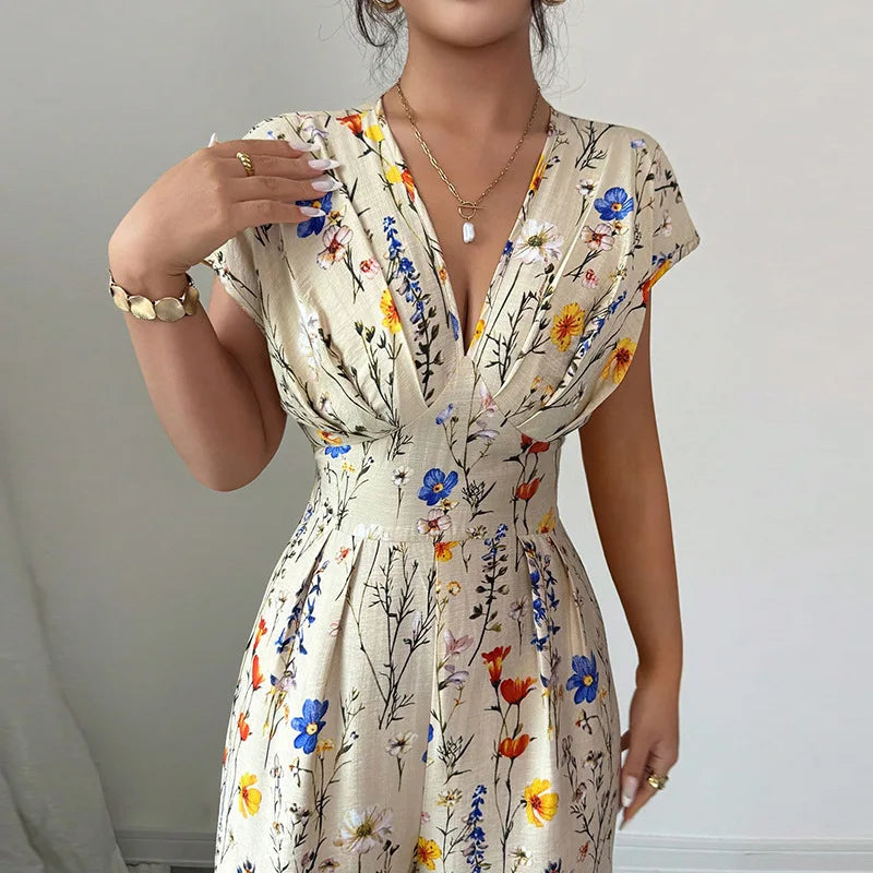 Rosemarie Blütenbeige Geblümter V-Ausschnitt Maxi Jumpsuit für Damen | Tailliert Elegant | Sommerurlaub Boho Stil - S/M/L/XL