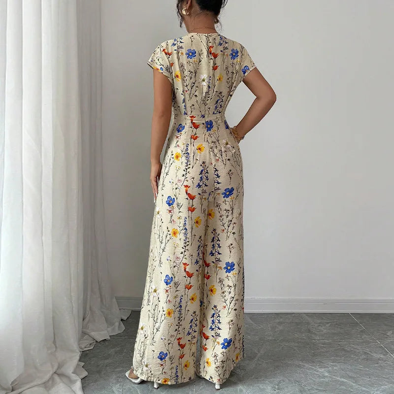 Rosemarie Blütenbeige Geblümter V-Ausschnitt Maxi Jumpsuit für Damen | Tailliert Elegant | Sommerurlaub Boho Stil - S/M/L/XL